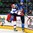 GRAND FORKS, NORTH DAKOTA - APRIL 21: Russia's Alexei Lipanov #10 takes out Finland's Urho Vaakanainen #7 behind the net during quarterfinal round action at the 2016 IIHF Ice Hockey U18 World Championship. (Photo by Minas Panagiotakis/HHOF-IIHF Images)

